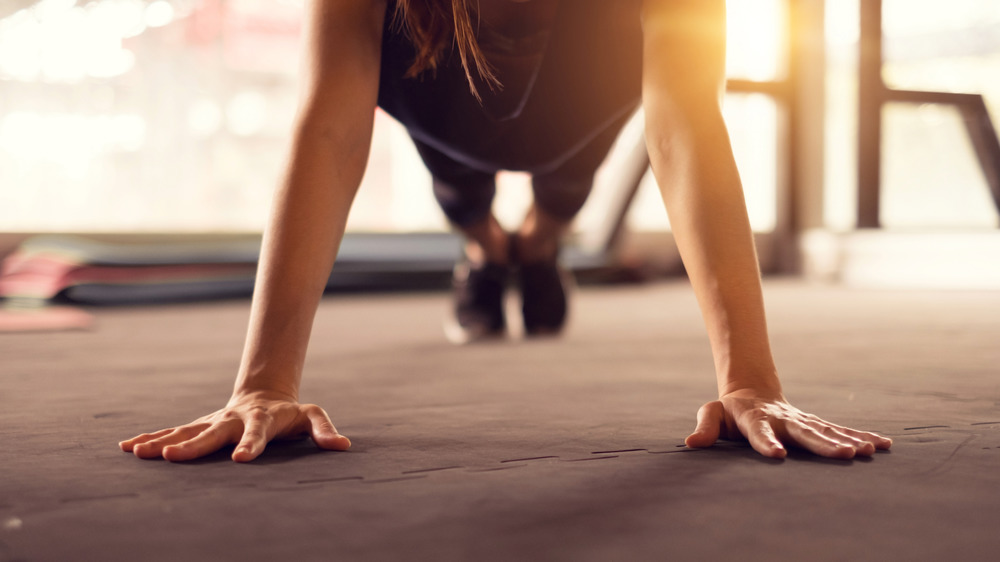 woman doing high plank