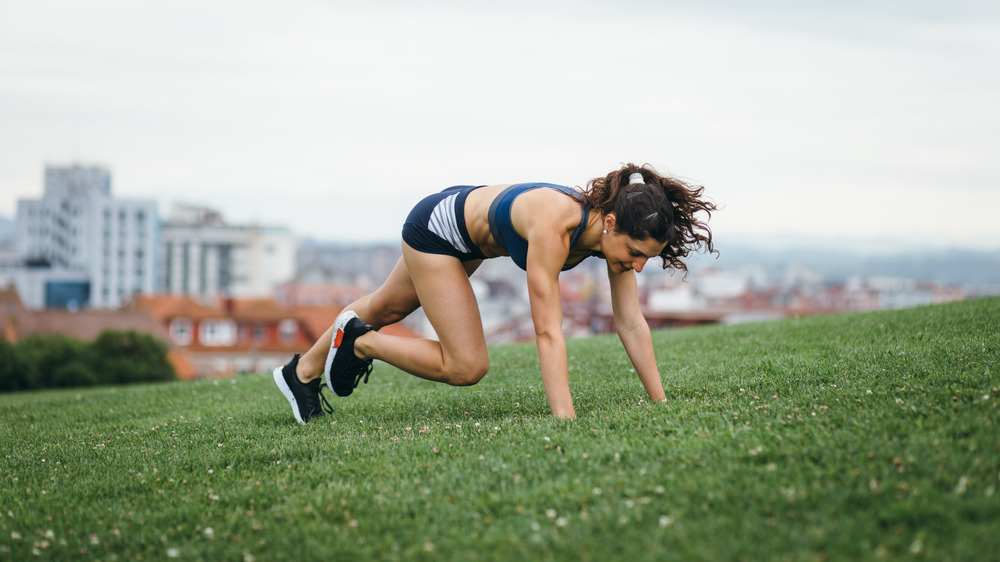 woman exercising outside