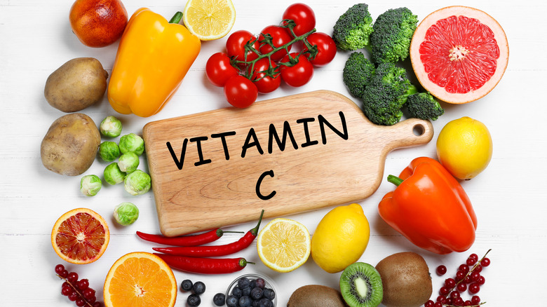 vitamin C sign with fruits and vegetables