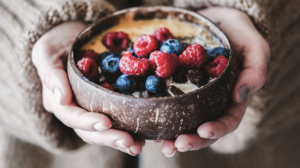 overnight oats in bowl with fruit topping