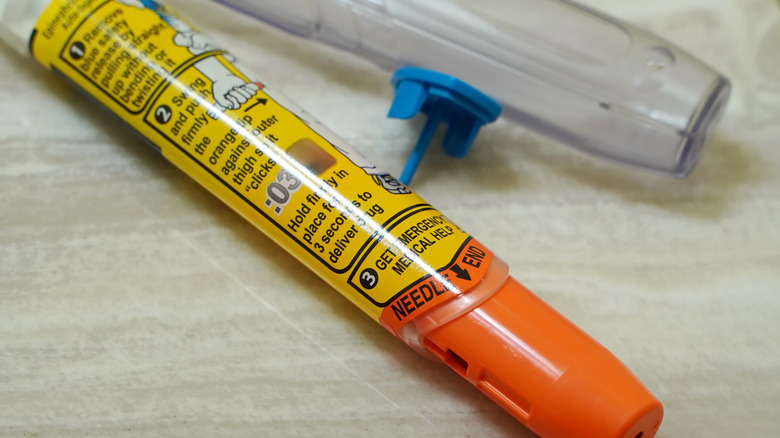 Epipen on wooden surface