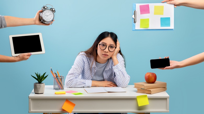 Overworked woman looking stressed