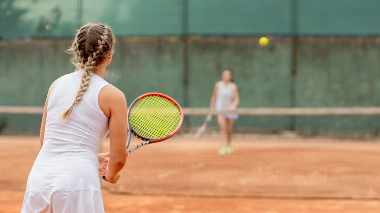 Women playing tennis