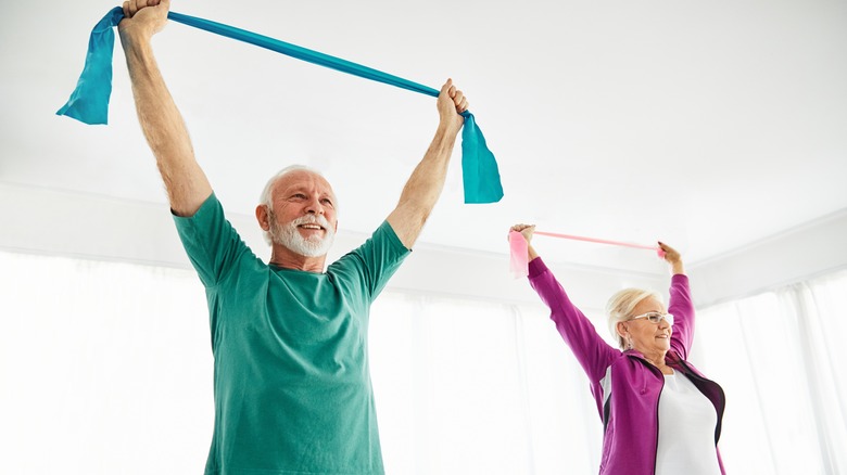 couple using resistance bands