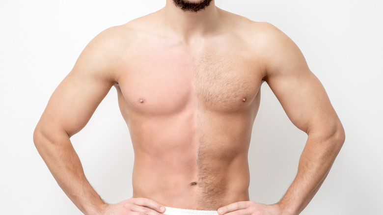 Young man with half-waxed chest