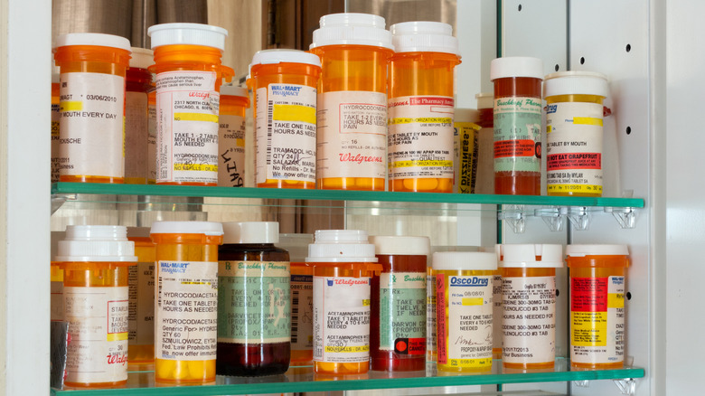 A collection of orange prescription bottles