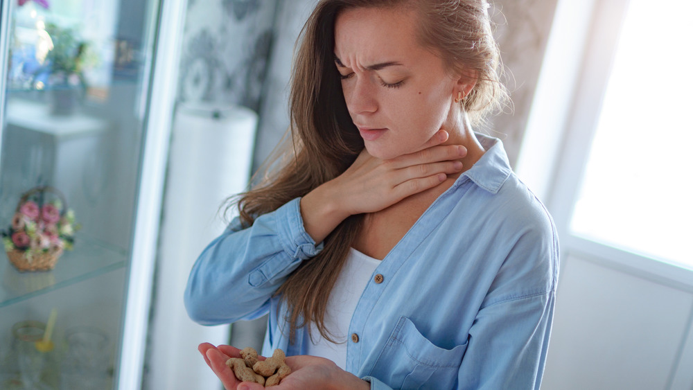 Woman gagging on food