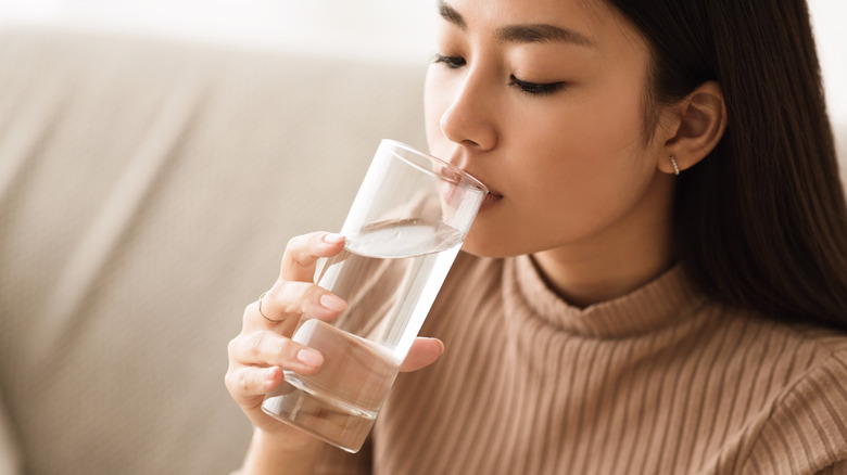 Woman drinking a glass of water