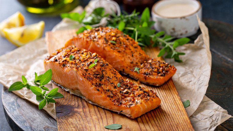 Cooked salmon on a cutting board