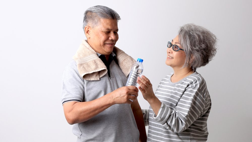 Couple with water bottle