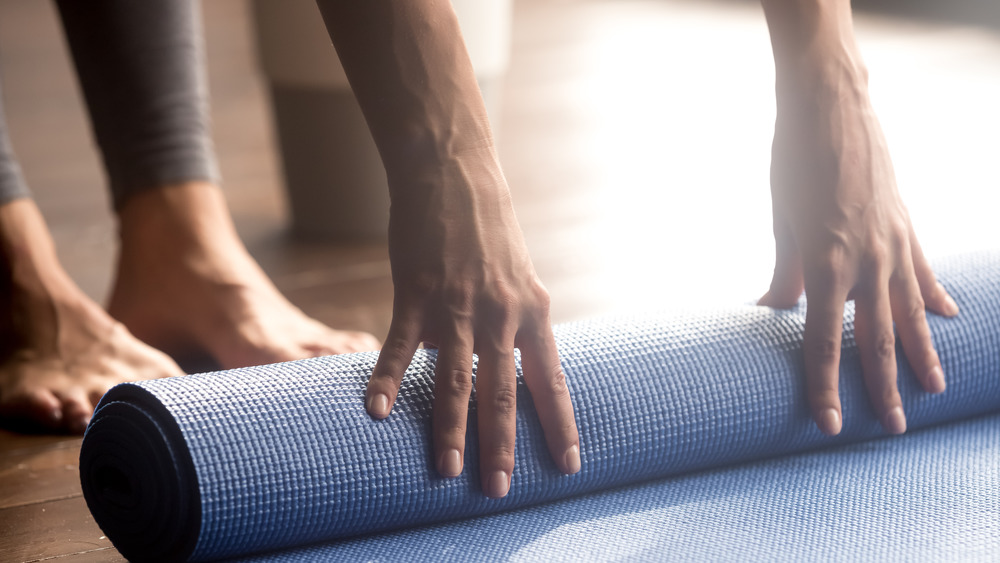 hands on yoga mat