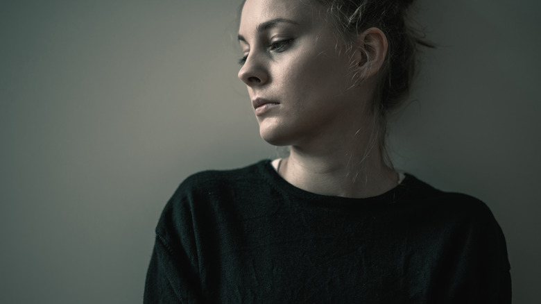 close up of woman looking sad and depressed