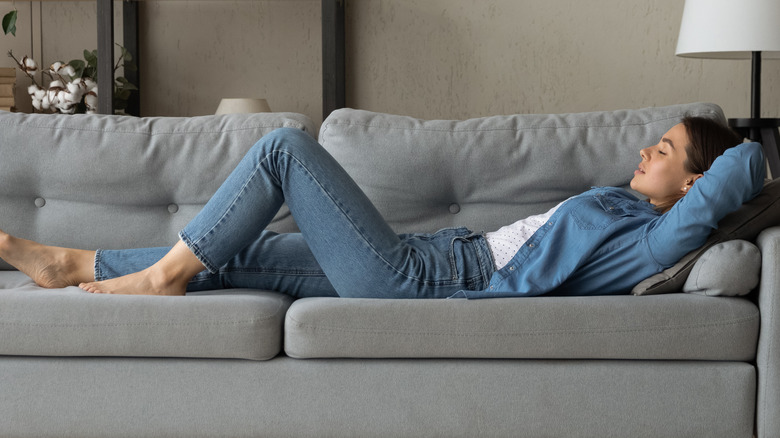 Woman taking nap on couch