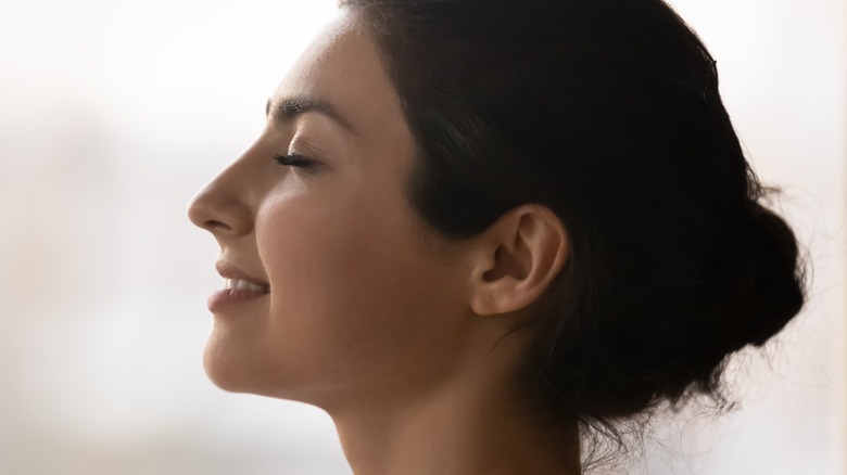 woman practicing breathing exercise