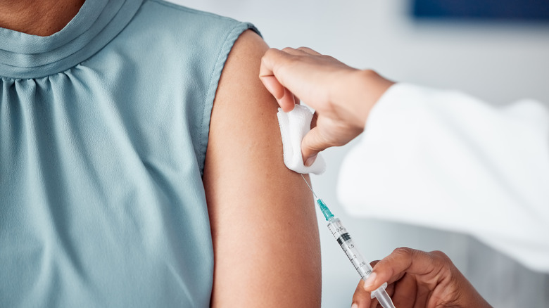 Woman getting a vaccine 