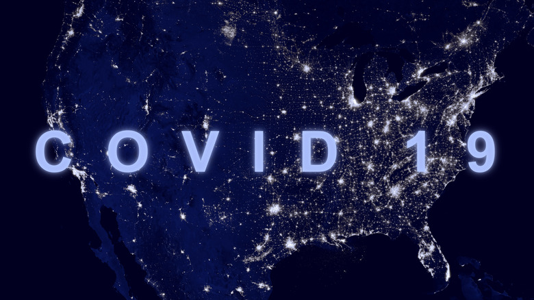 Map of the United States with the words "COVID 19" across it