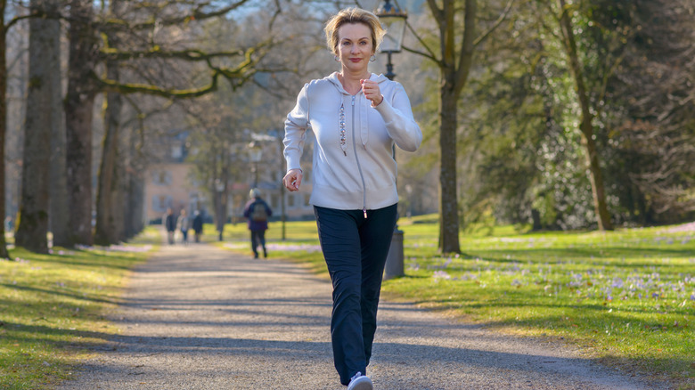 Attractive mature woman taking her daily jog