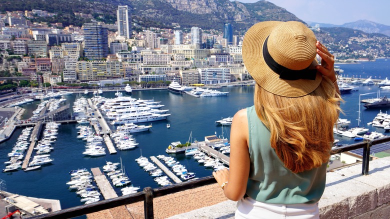 woman overlooking the harbor at Monaco