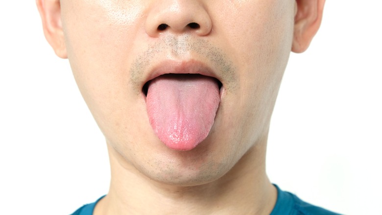 Person sticking out tongue