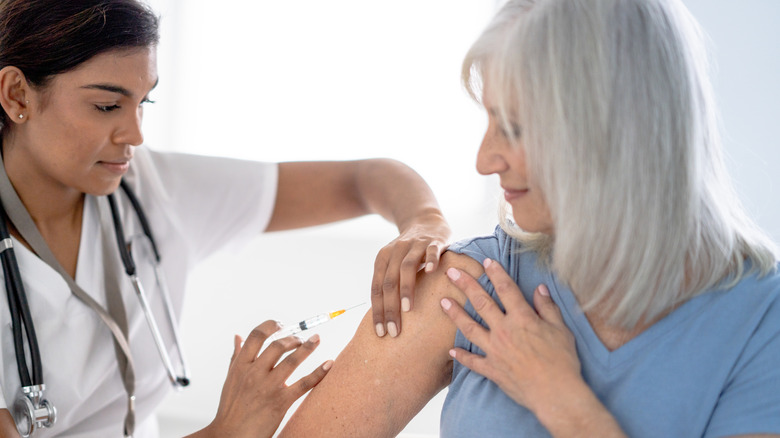 woman getting a vaccine