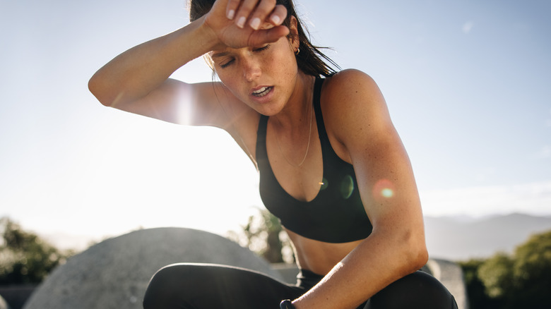 Woman tired from outdoors exercise