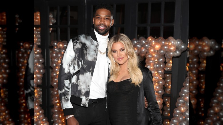 Tristan Thompson and Khloé Kardashian smiling