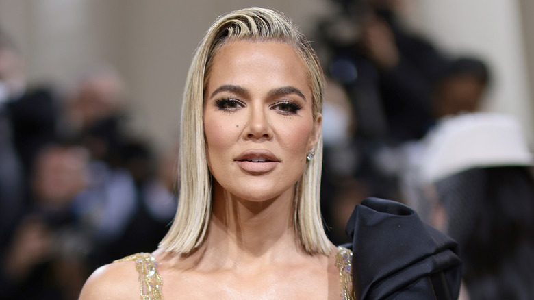 Glammed up Khloé Kardashian smiling at the 2022 Met Gala