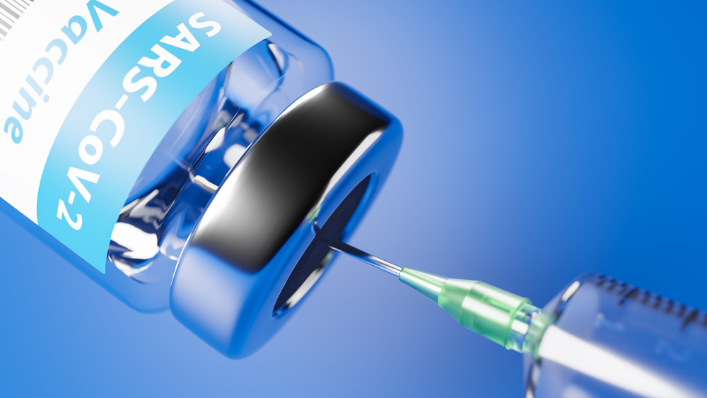Needle and bottle of SARS-CoV-2 vaccine
