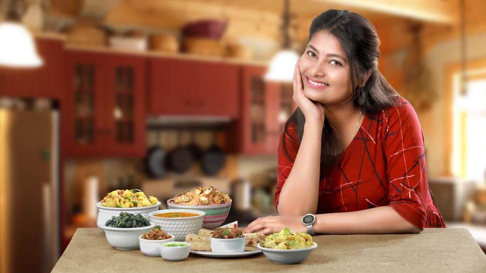 Woman with Indian food