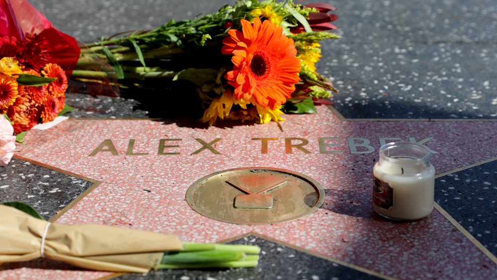 Flowers at Alex Trebek's star on the Hollywood Walk of Fame 