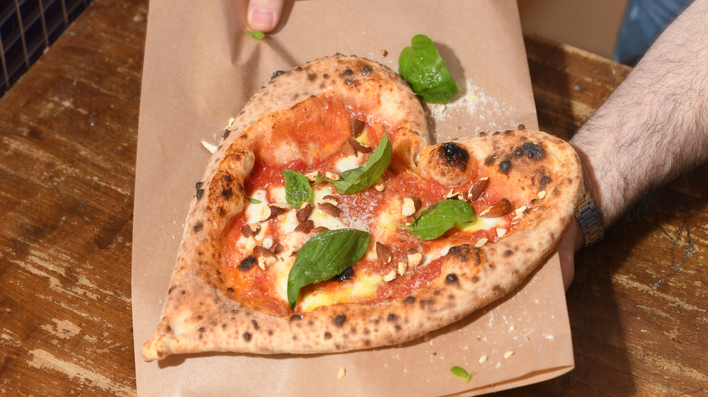 A heart shaped Neapolitan pizza