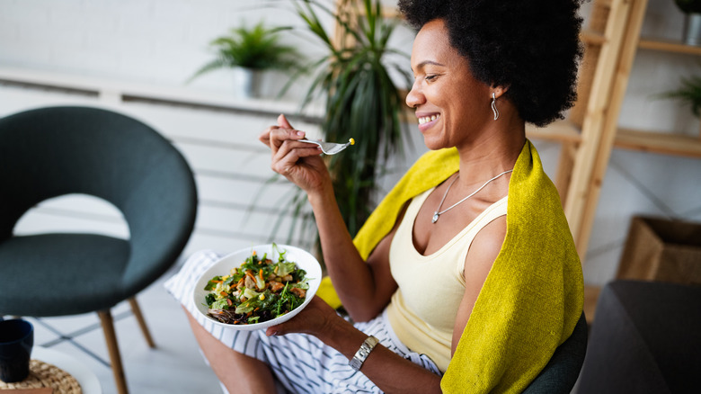 Woman eating a balanced meal