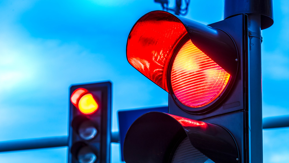 A traffic light lit up red