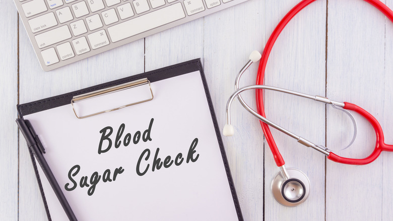 blood sugar chart with stethoscope