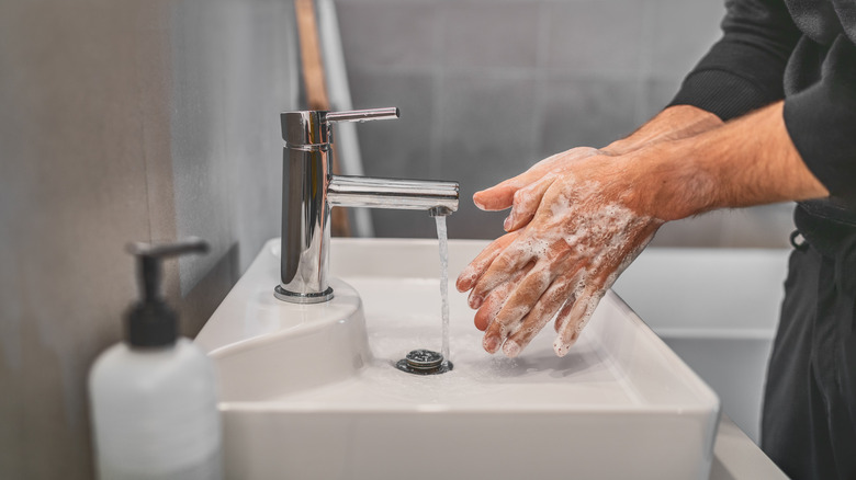 Man washing his hands