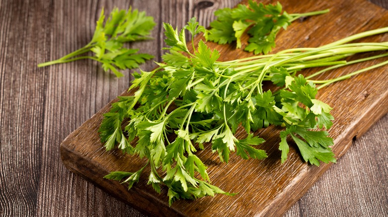 parsley on a cutting board