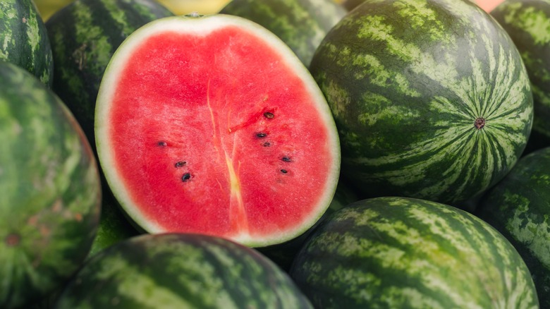 watermelon half on large pile