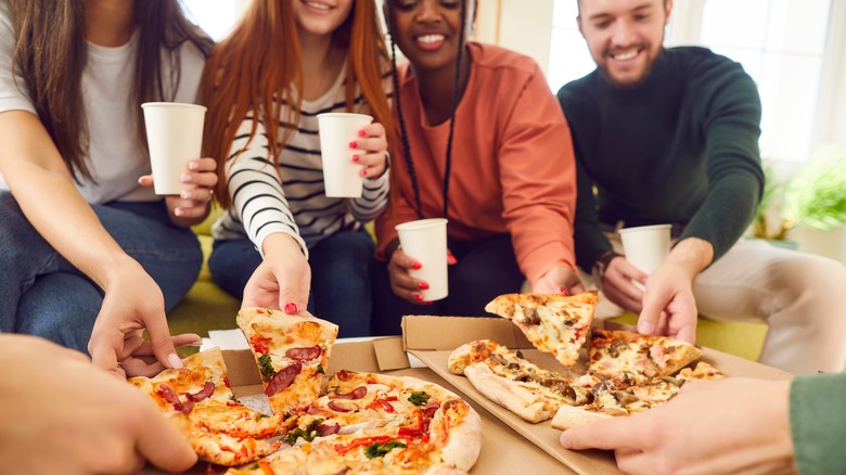 people eating pizza