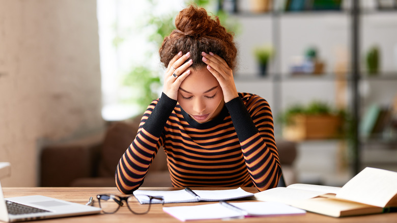 Young woman feeling stressed