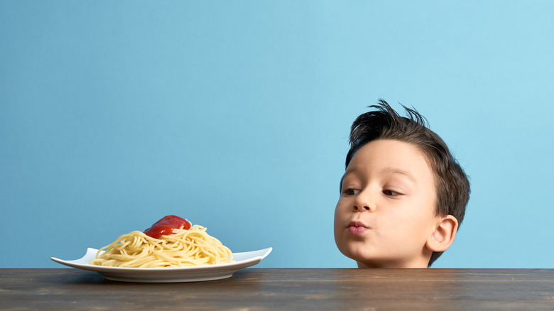 Kid looking at food