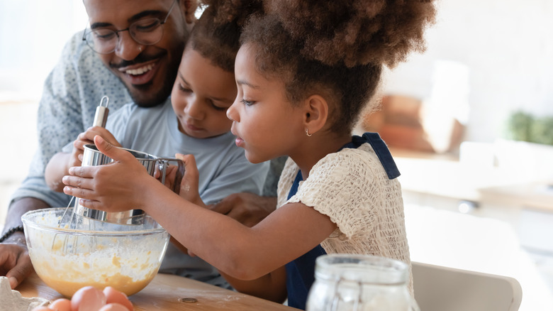 A family makes pancakes together