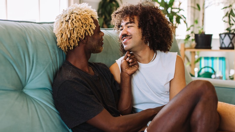 Smiling couple looking into each other's eyes