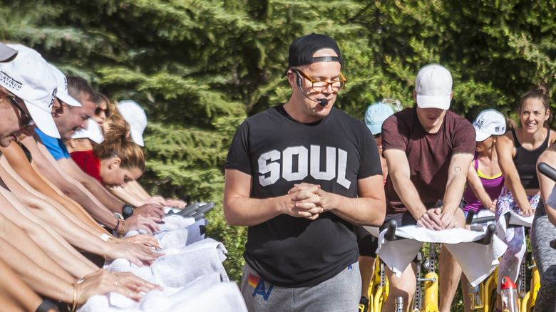 SoulCycle instructor teaching an outdoor class