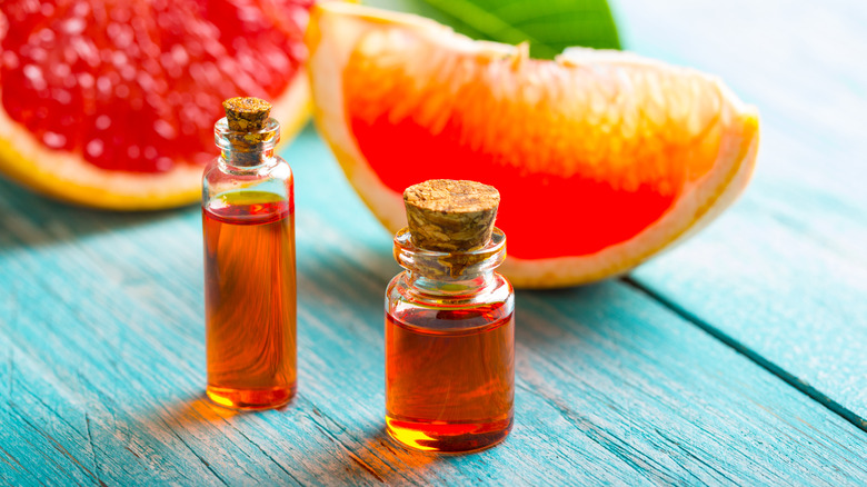 Two bottles of grapefruit oil