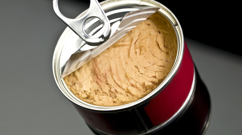 a half opened can of tuna