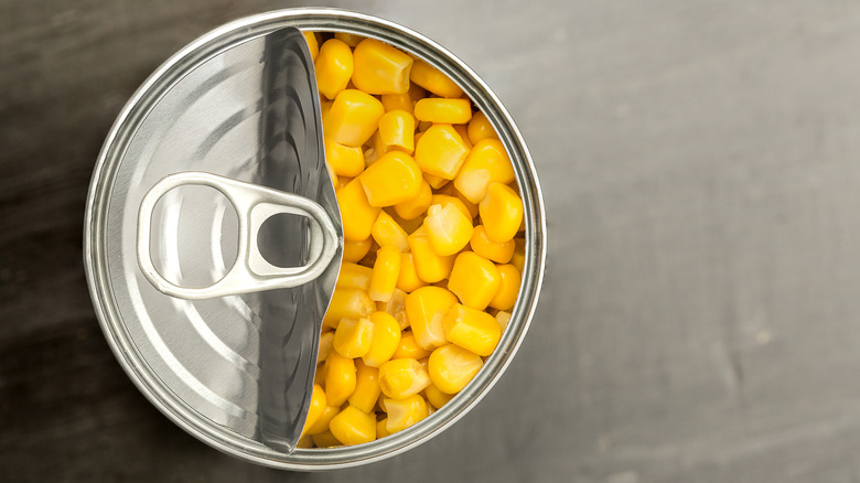 a half-opened can of corn