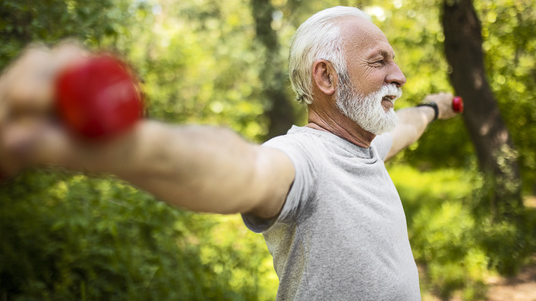Older man exercising outdoors