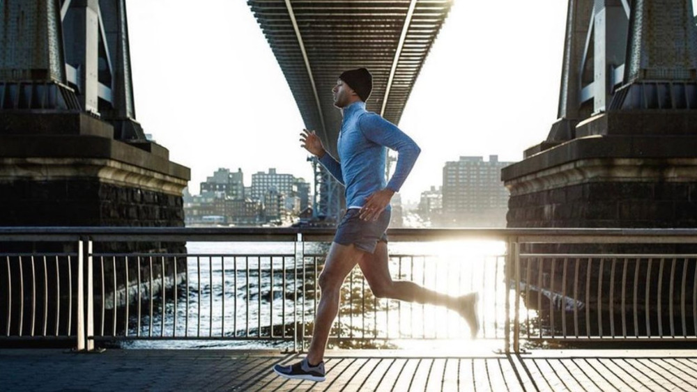 Bachelor Matt James running outside 