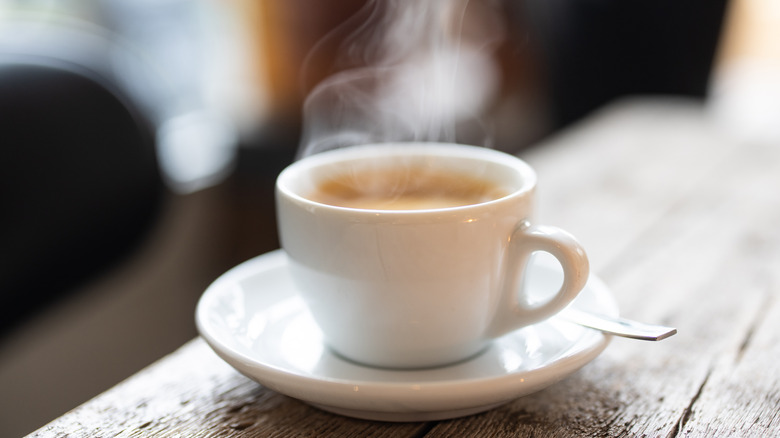 Steam rising from a cup of coffee