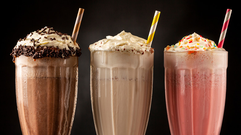 Three milkshakes (chocolate, vanilla, and strawberry)